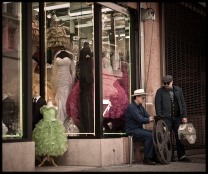 Photo of Carlos Grasso and James Slay in front of a bridal store.